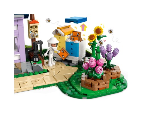 Конструктор LEGO Friends Будиночок і квітник бджолярів (42669)