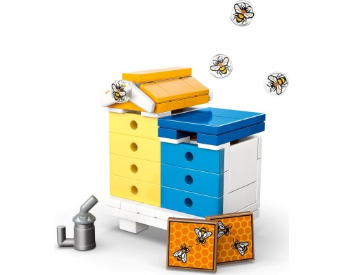 Конструктор LEGO Friends Будиночок і квітник бджолярів (42669)
